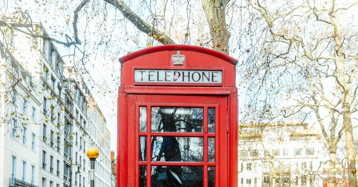 A classic London red telephone box — for a Latvian guide's briefing for British travellers heading to Riga.